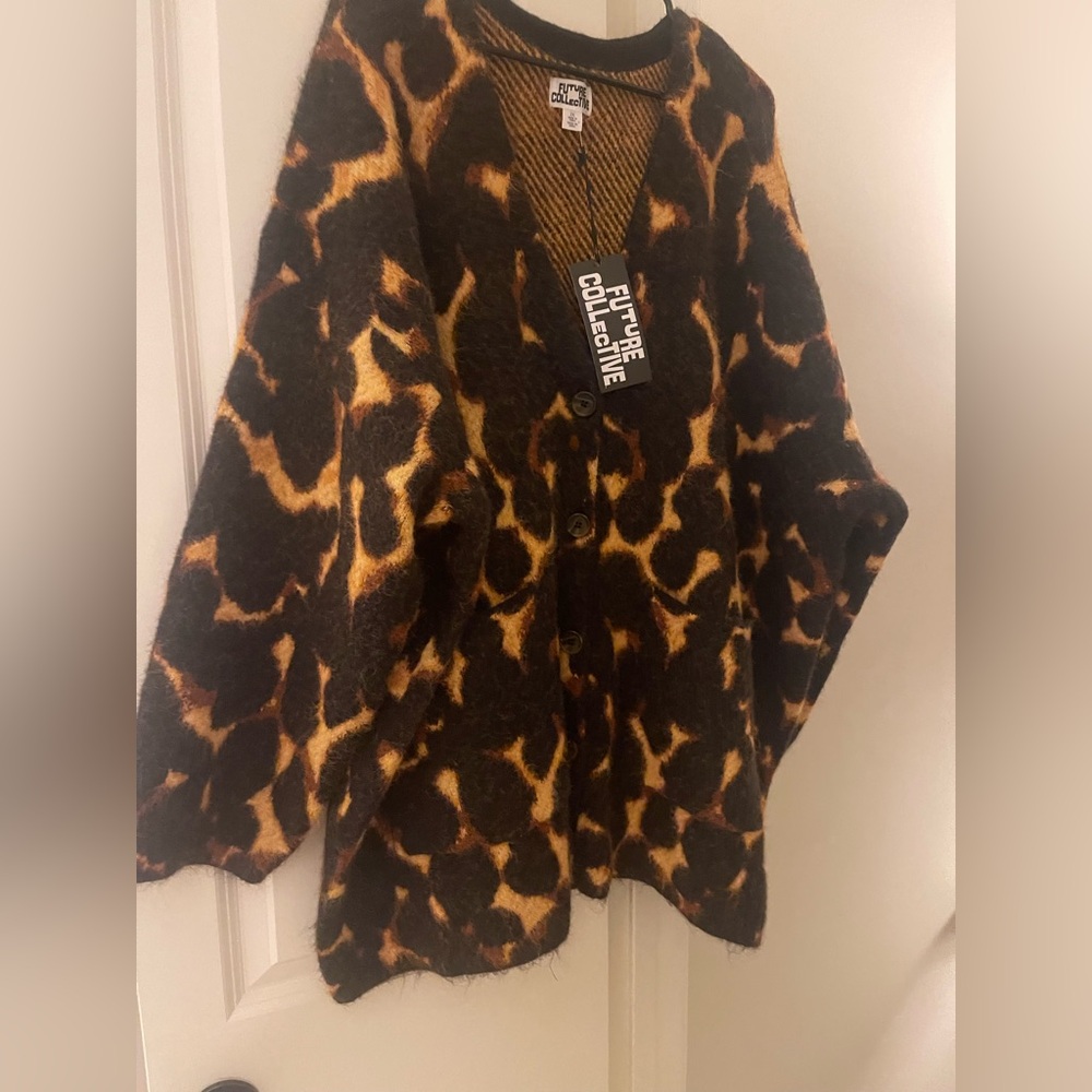 NWT Target Future Collective Cardigan. There is one snag by the right pocket.
